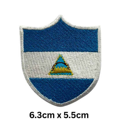 Shield Flag Patch – Embroidered Iron On / Sew On Shield Shaped National Flag Badge | All Countries Available | Heraldic Crest Patch for Jacket, Backpack, Biker Vest, Uniform – Choose Your Country (K-S)