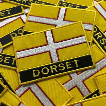 UK County Flag Patch 9.5cm x 6cm Embroidered Iron On/Sew On Badge Durable Fabric Applique for Jackets, Backpacks, Hats, and Clothing